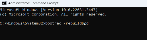 Type in bootrec /rebuildbcd