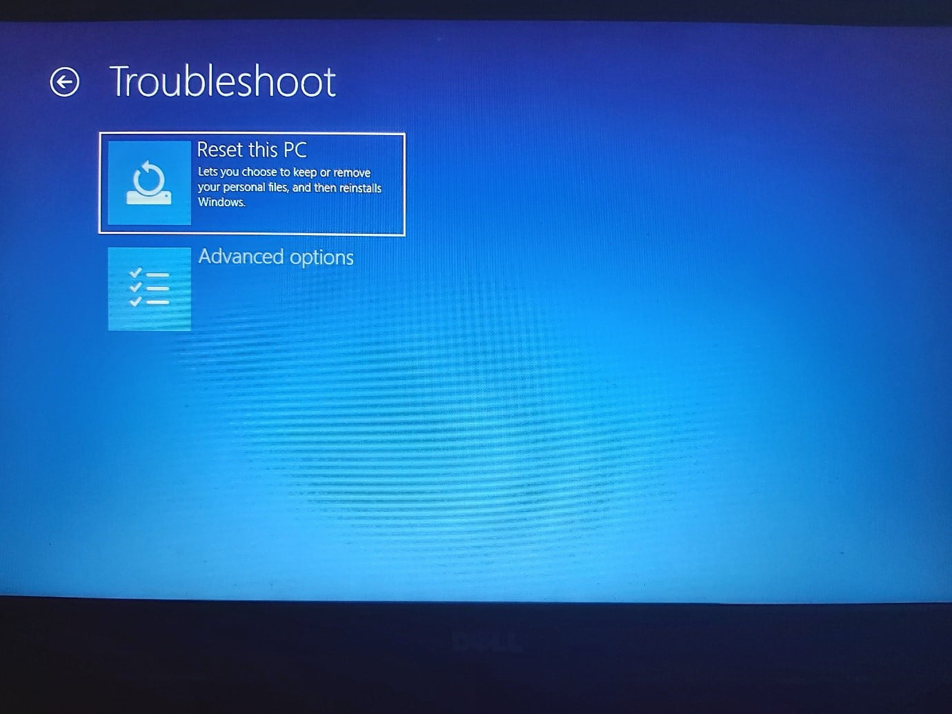 Select Reset this PC on the Troubleshoot page