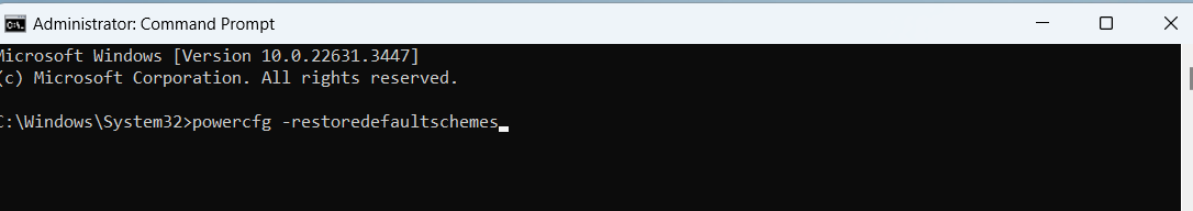 Once the Command Prompt window opens, type the following command into it and then hit <em>Enter</em>: powercfg -restoredefaultschemes