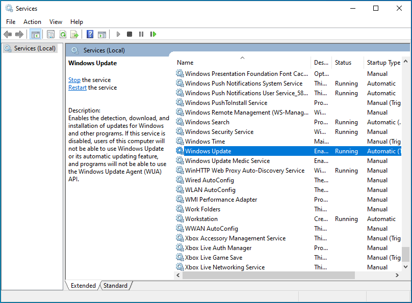 When the services window opens, scroll down the list to locate <em>Windows Update</em>