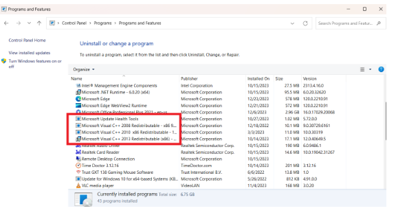 Click “Programs” and select “Programs and Features