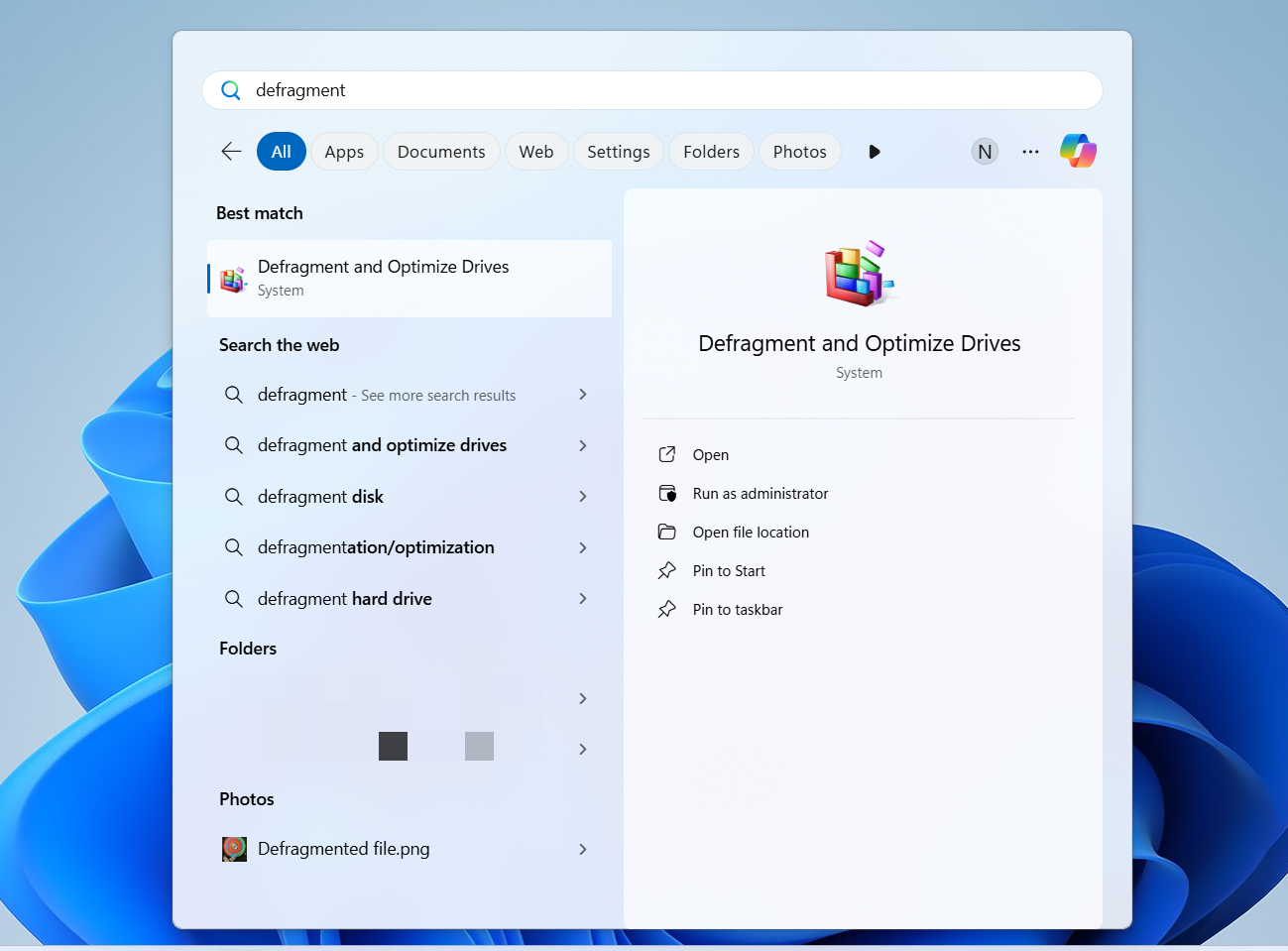 Click Defragment and Optimize Drives in the search results