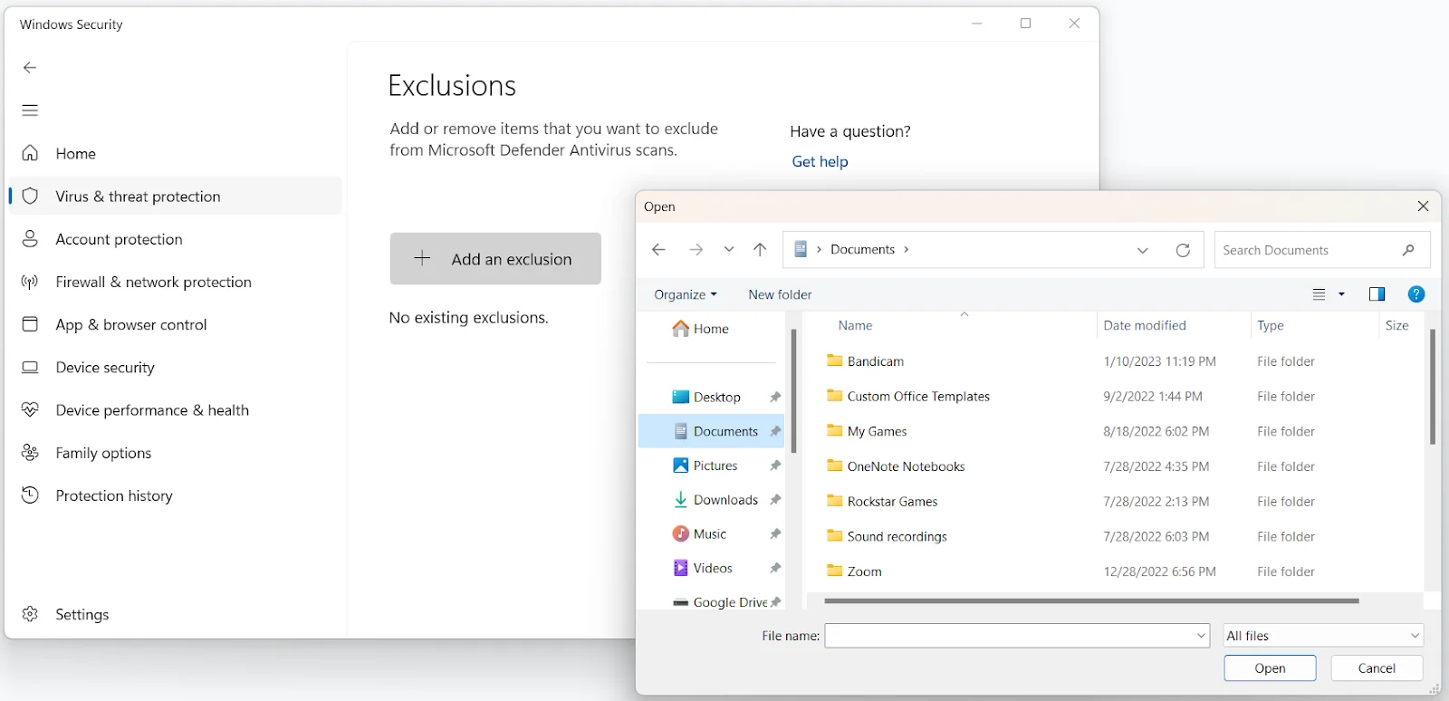 Scroll down to Exclusions once you see the Virus & Threat Protection Settings screen, and click on <em>Add or remove exclusions</em>