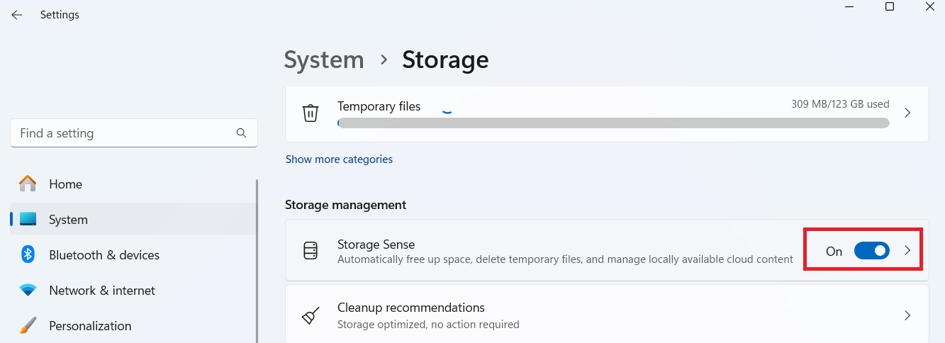 Scroll down and toggle the Storage Sense switch