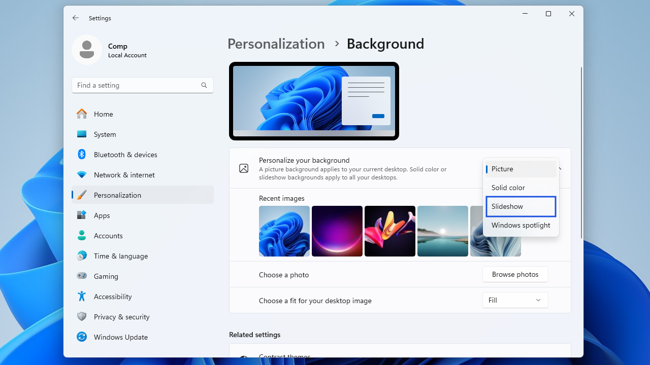 Select Slideshow beside Personalize your background.