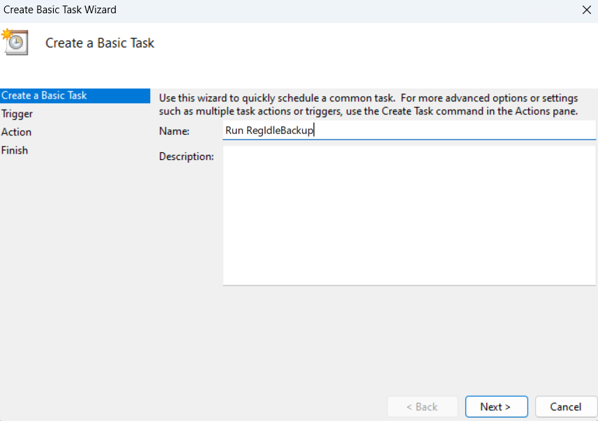 When a window pops up, enter Run RegIdleBackup in the Name section and click Next.