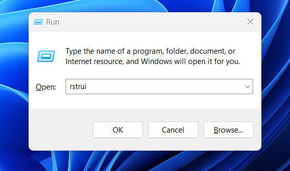 Press Windows + R and type rstrui before pressing Enter