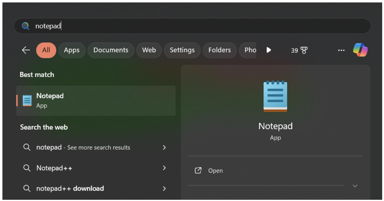Open the Notepad application. To initiate this process, locate and click on the “Notepad” icon after searching for it