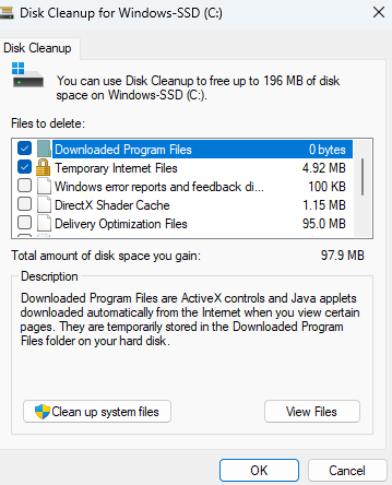 Once the Disk Cleanup window appears, check the boxes beside the temporary files that you wish to delete, then click on the <em>OK</em> button