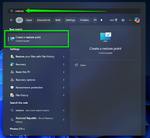 Type “<i>Restore</i>” and click <i>Create a restore point</i>
