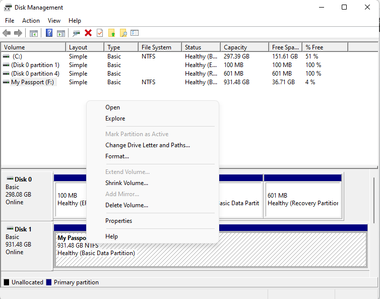 Right-click on the disk space below the blue bar and click on Change Drive Letter and Paths