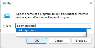 Type diskmgmt.msc and click OK to open the Disk Management window