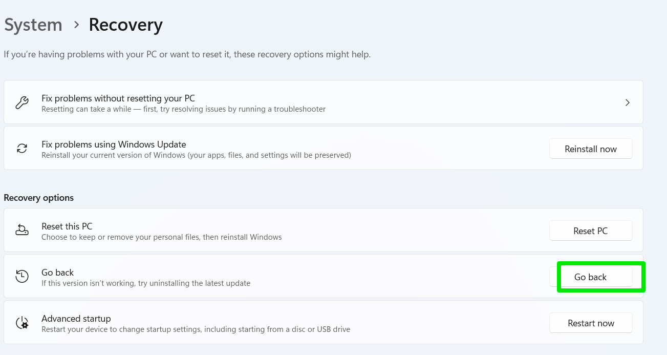Go to the <em>Recovery options</em> section and click the <em>Go back</em> button