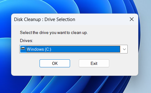 Select Disk Cleanup and choose your hard drive to clean temporary files