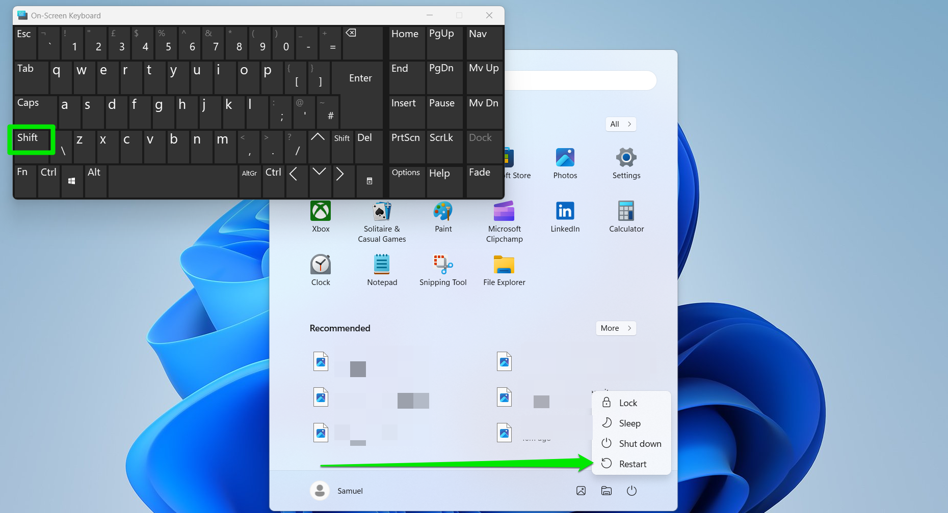 Hold down the Shift keyboard button and select Restart