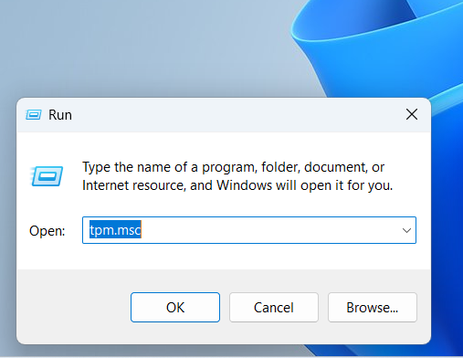 Type tpm.msc into the text box and hit Enter