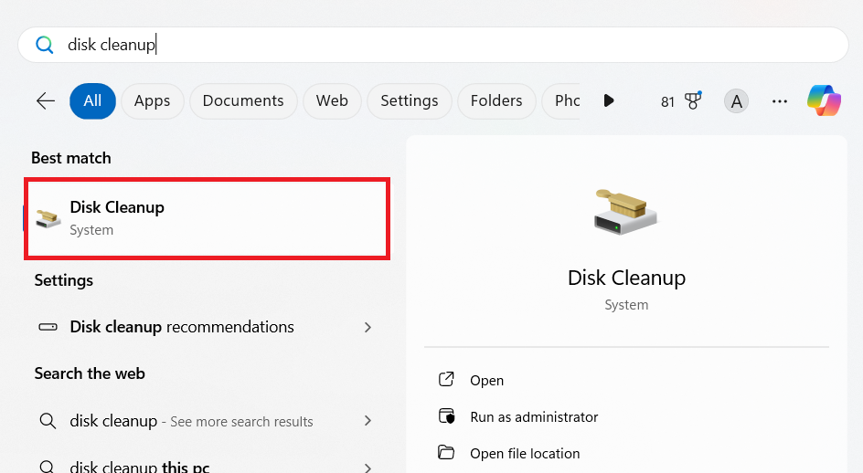 Go to the Windows search field, type Disk Cleanup, and hit Enter