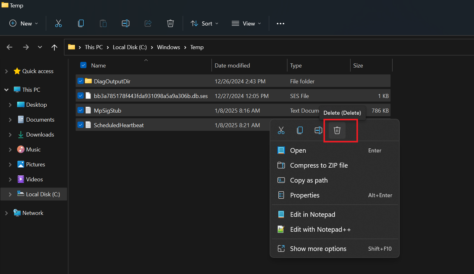 Press Ctrl + A to select all the files in the folder. Then, right-click and select Delete. Confirm the deletion if prompted