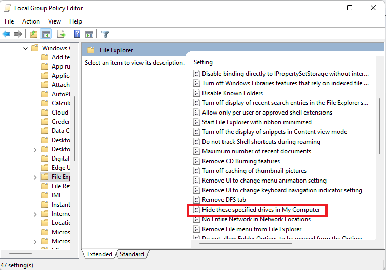 Scroll down to the Hide these specified drives in My Computer option and double-click on it