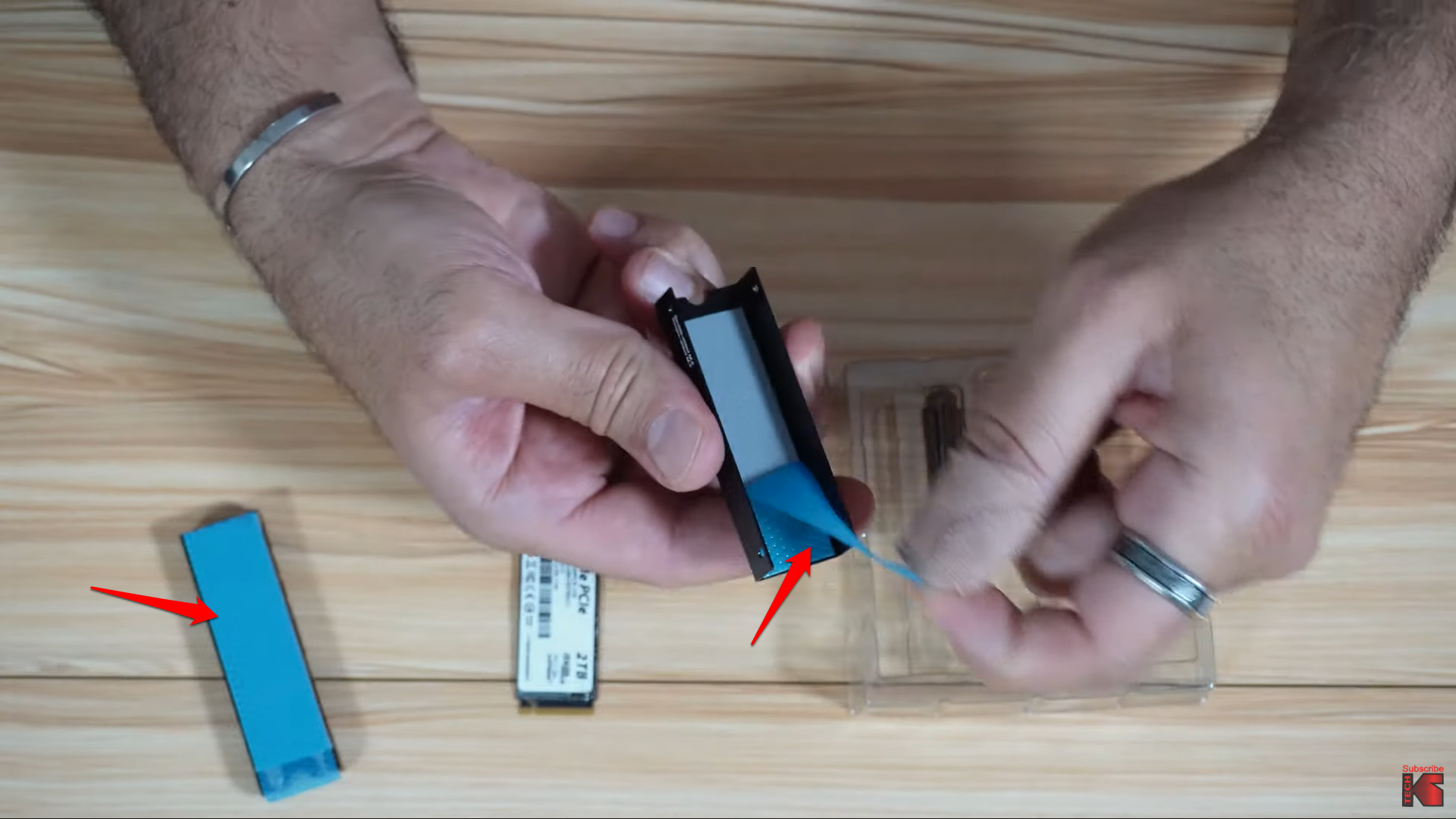 you’ll have to remove the protective films from the top and bottom parts of the SSD enclosure